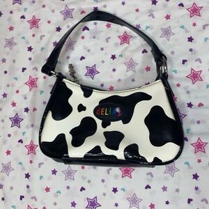Delia’s X Dolls kill cow print purse